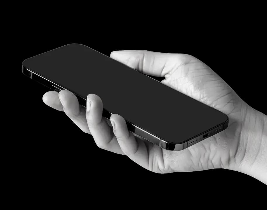 Hand holding a phone with eSIM